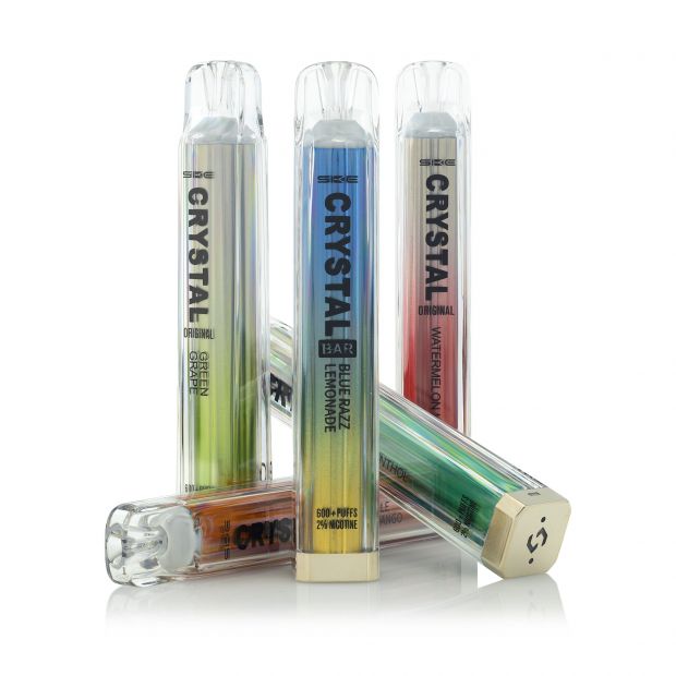 A collection of five Crystal Bar Disposable vapes with a plain white background. The flavours shown are Green Grape, Watermelon Ice, Blue Razz Lemonade, Menthol and Pineapple Peach Mango