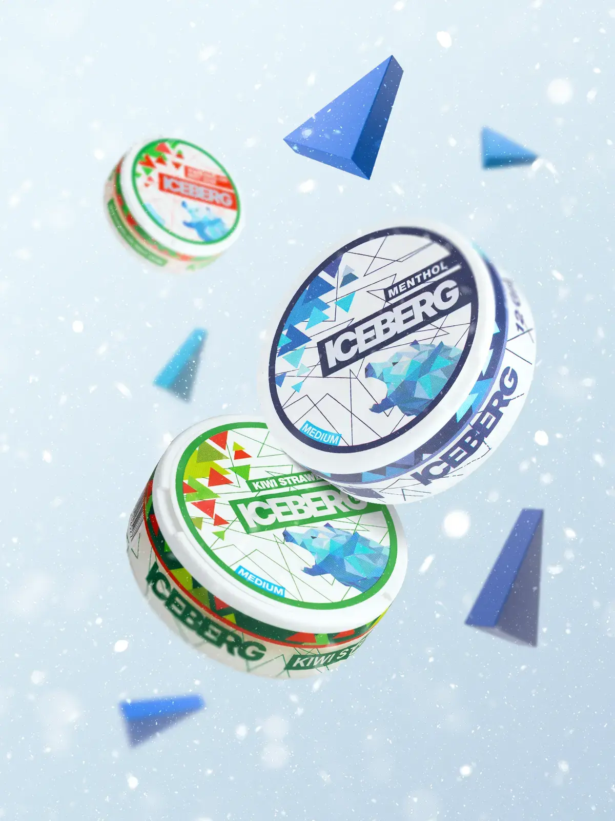 Three tubs of Iceberg nicotine pouches featuring Menthol and Kiwi Strawberry flavours, floating in front of a stylised icy themed background