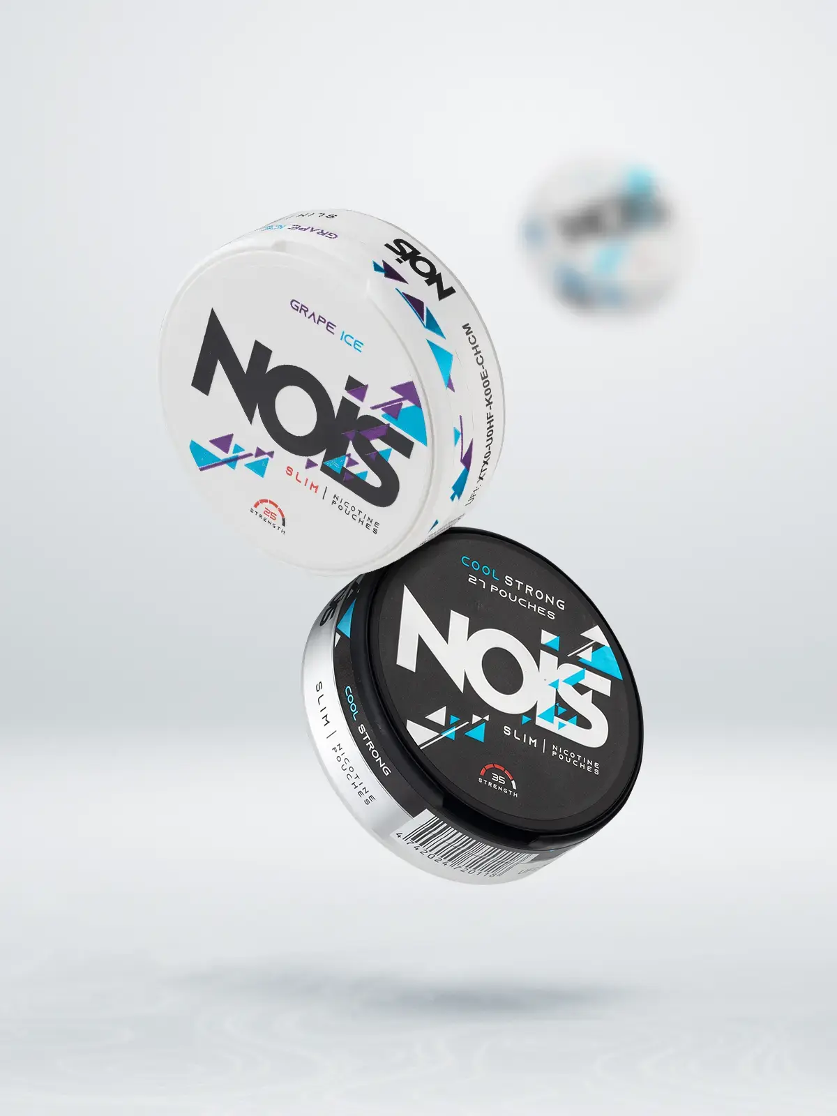 Two tubs of Nois nicotine pouches; one in Grape Ice flavour and one in Cool Strong flavour. Floating in front of a bright background, with an out-of-focus tub floating in the background.