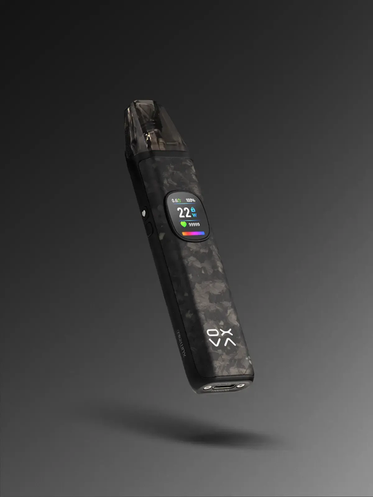 A black OXVA XLIM Pro 2 DNA kit on a grey-ish black background