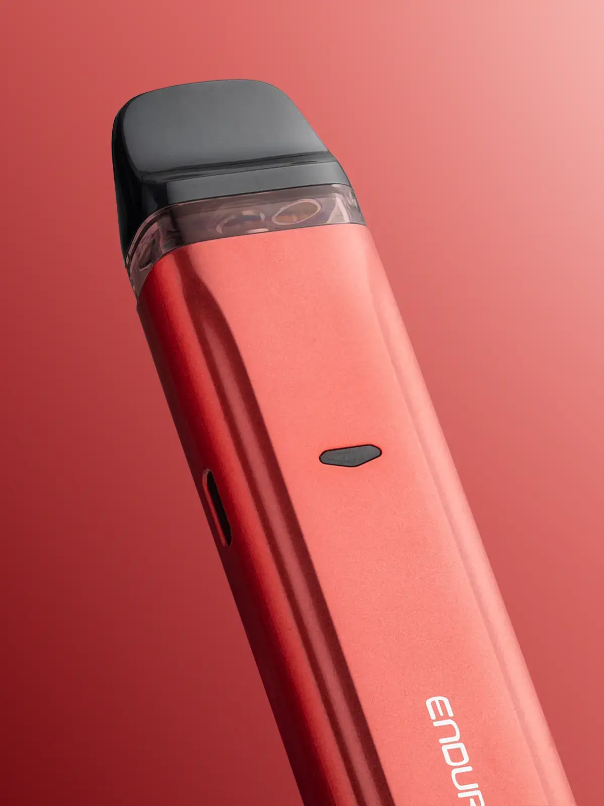 A close-up of the top half of the Red coloured Innokin Endura V device in front of a red background