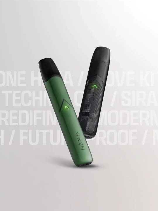 A green HEXA One kit and a black HEXA Move kit floating side by side on a white background