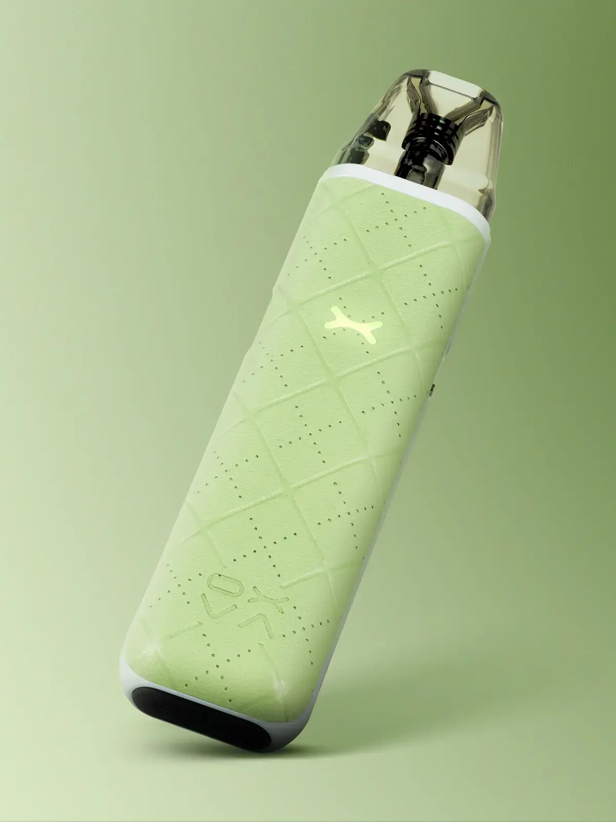 OXVA Xlim Go device in Light Green colour, leaning in front of a green background