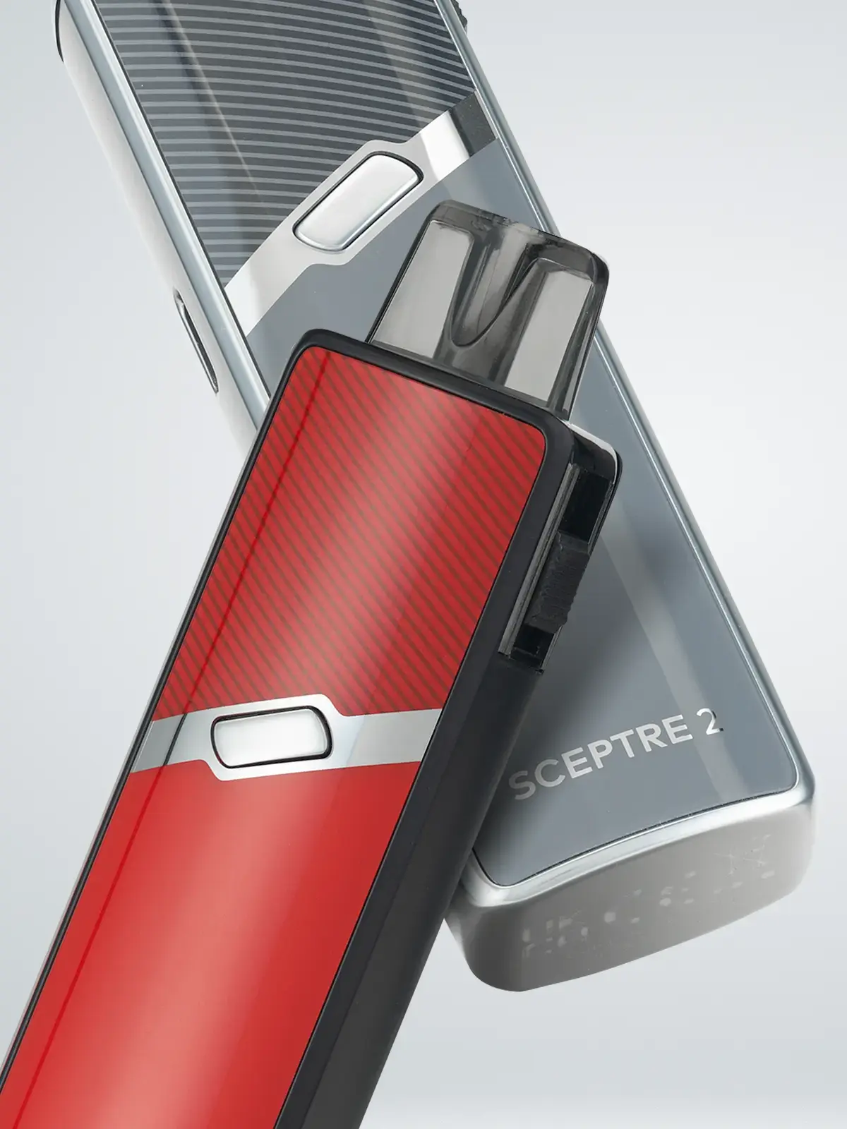 Two Innokin Sceptre II devices in Grey and Red, laying across eachother.