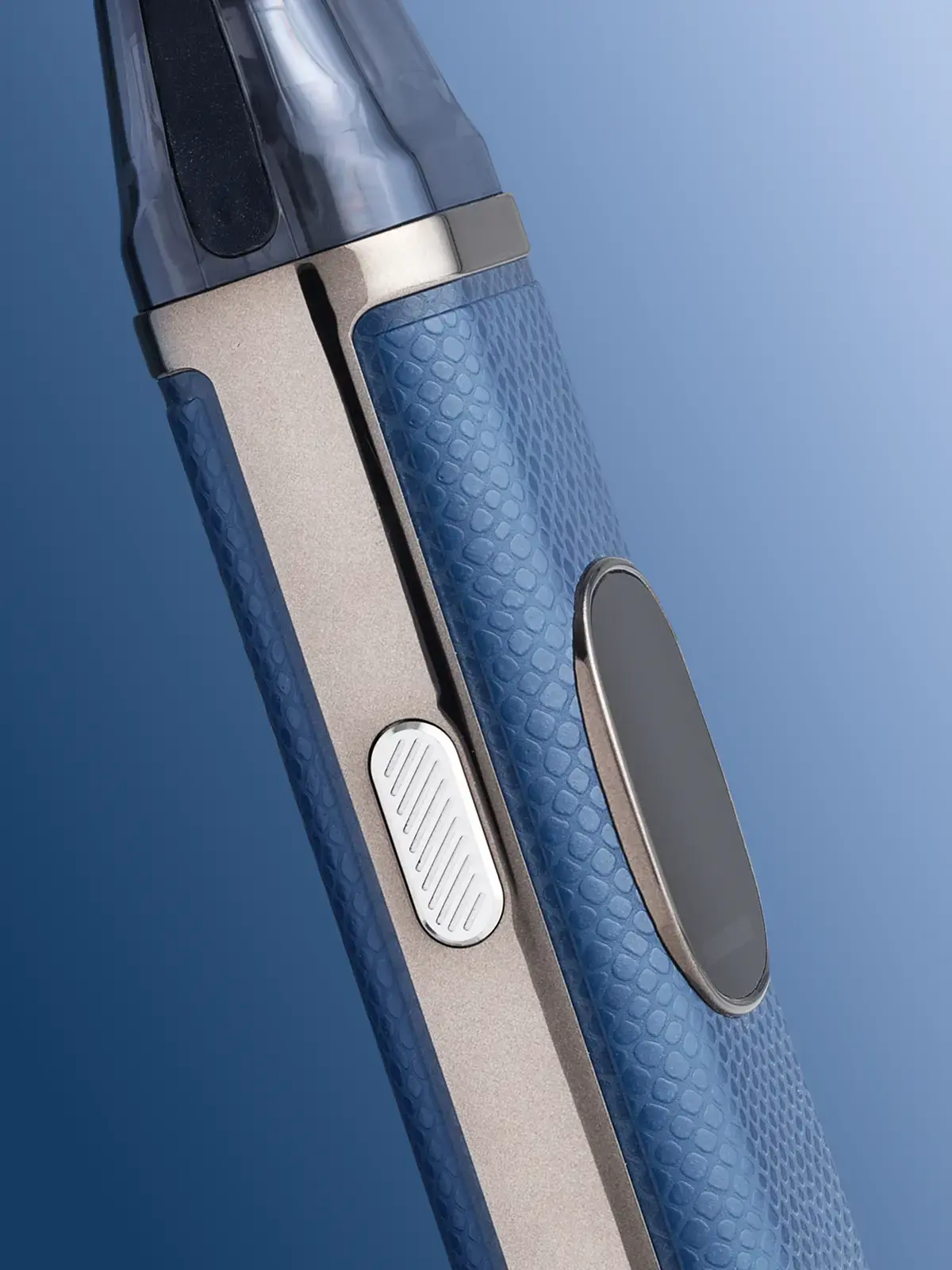 A close up of the side of an OXVA Xlim Pro 2 in Blue Python colour showing the button on the side, in front of a blue background