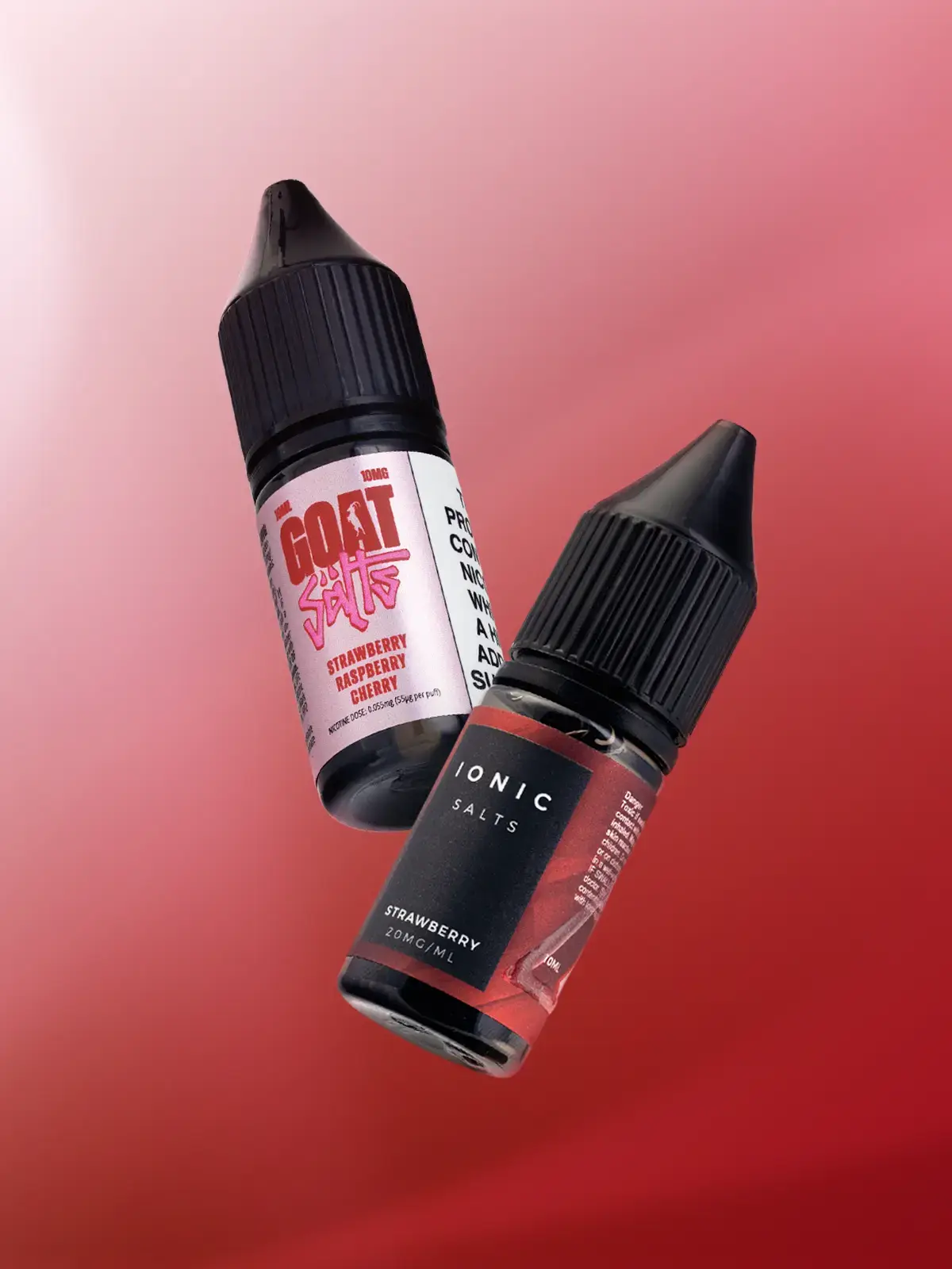 Two bottles of Strawberry e-liquid; Strawberry Raspberry Cherry by GOAT Salts and Strawberry by Ionic Salts, floating in front of a red gradient background