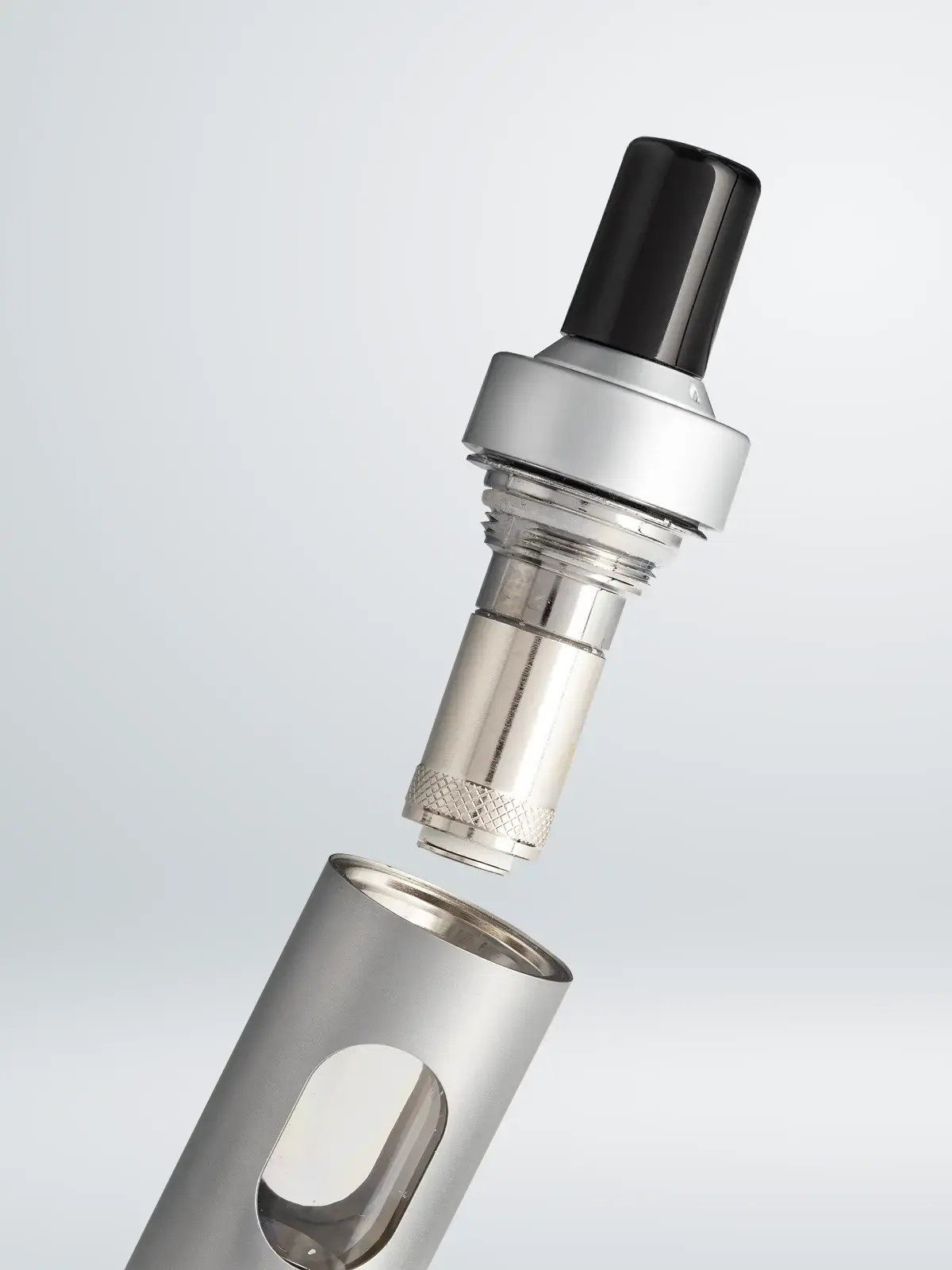 Joyetech eGo AIO 2 with its cap unscrewed revealing the coil