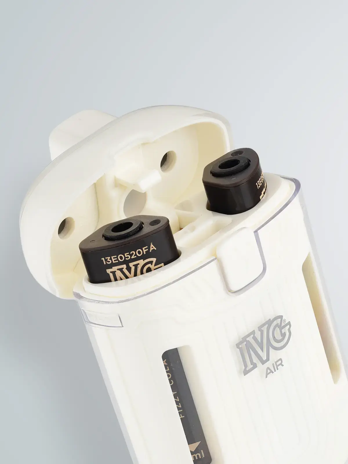 A close-up of the IVG 2in1 device in white, showing two pods inside it.