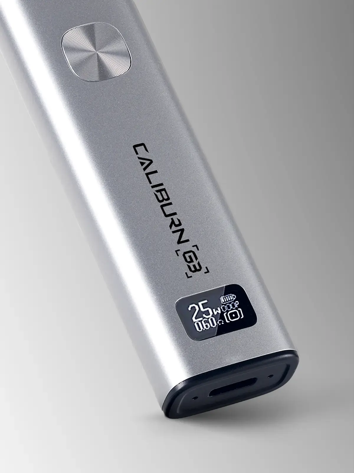 UWELL Caliburn G3 in Silver showing its intuiative OLED display. Leaning slightly in front of a grey background.