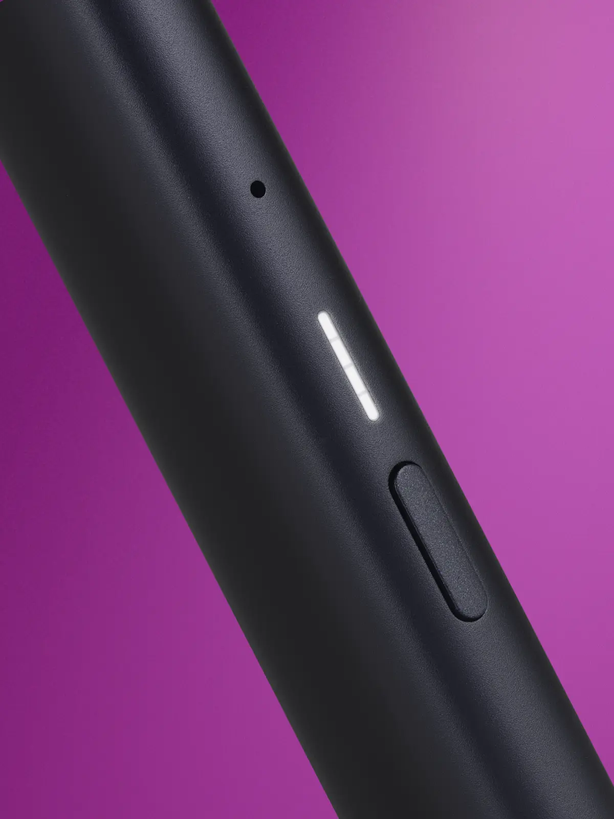 Close up of Veev One Device in front of a purple background